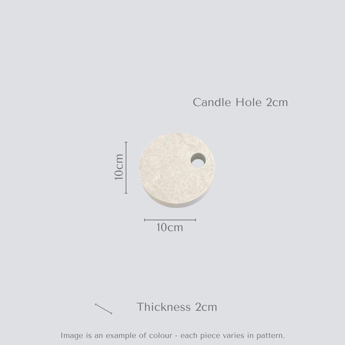 Quartz Round Single Candle Holder in Caesarstone Airy Concrete created by Aureliia Collection. Close up image showing this candle holder has a feel of concrete in full movement. Measurements shown. The perfect home decor item.