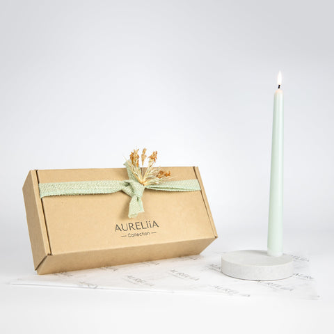 Quartz candle holder gift pack by Aureliia Collection. A marble candle holder in appearance, the quartz Quartz candle holder gift pack is the perfect home decor gift for someone who has it all. Product includes a quartz candle holder in Airy Concrete, a Sage coloured candle and gift wrapping. 