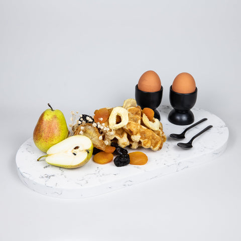 Double arch quartz platters in Caesarstone White Attica created by Aureliia Collection. The double arch quartz platter shown with eggs, waffles topped with dried fuit and pear. An excellent home decor gift for someone who has it all.