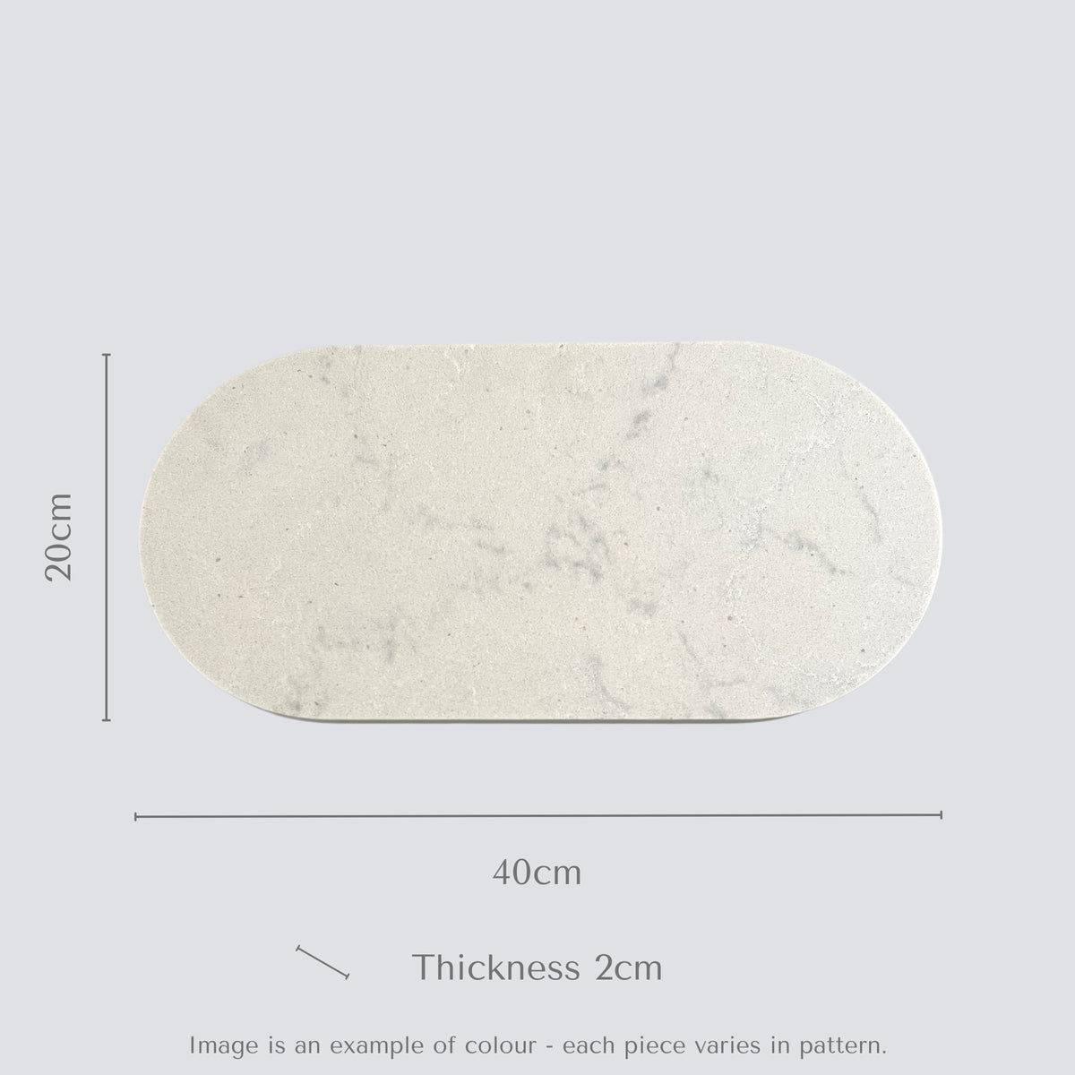 Double arch quartz serving platter in Caesarstone Georgian Bluffs™ created by Aureliia Collection. Unstyled food platter shows product colour a cloudy light grey, with delicate dashes of soft charcoal that disappear and resurface. An excellent home decor gift for someone who has it all.